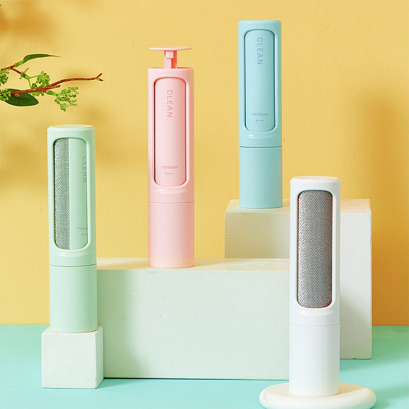 Reusable pet hair remover brush with self-cleaning base