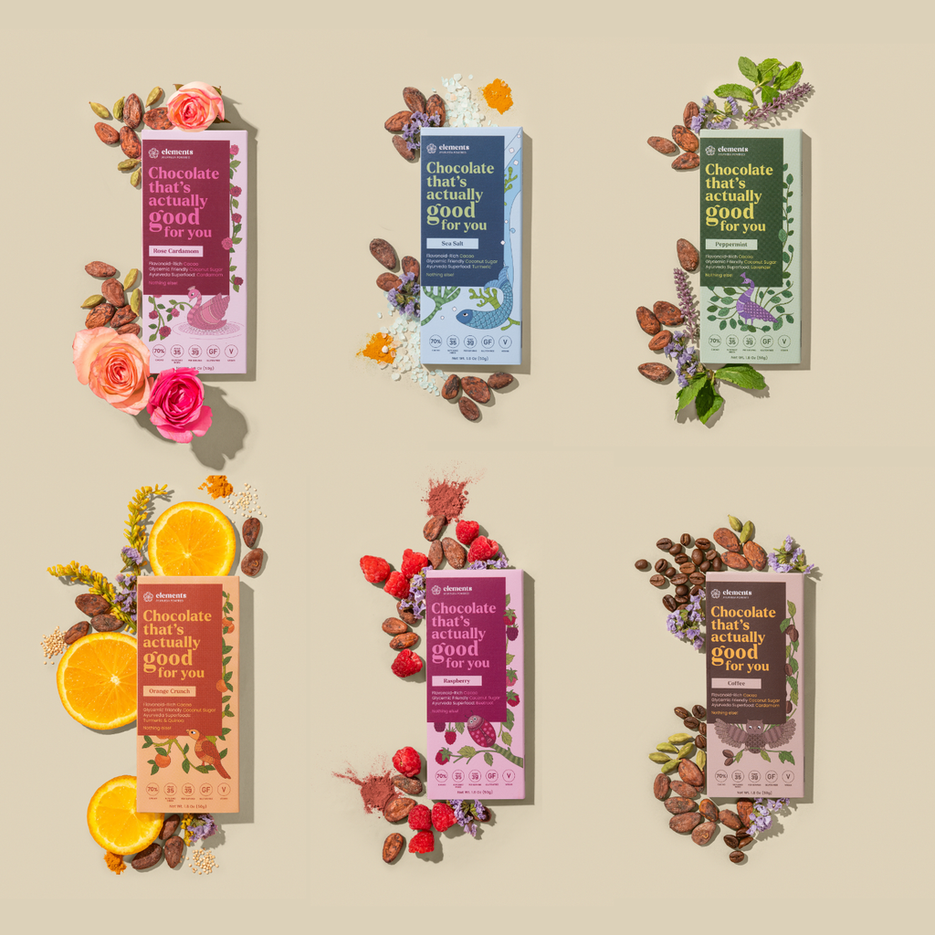 Chocolate packages with various ingredients on a beige background