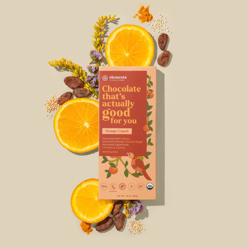Orange Crunch chocolate bar box with oranges, dates, and flowers by Elements Truffles