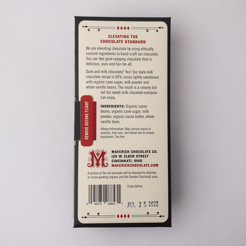 Back of a chocolate bar packaging with text and branding on a light gray background