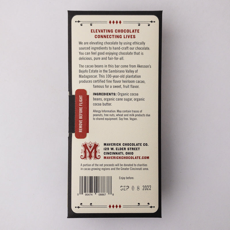 Back of a chocolate bar packaging with text and branding on a light gray background