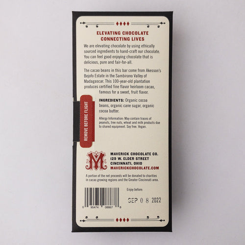 Back of a chocolate bar packaging with text and branding on a light gray background