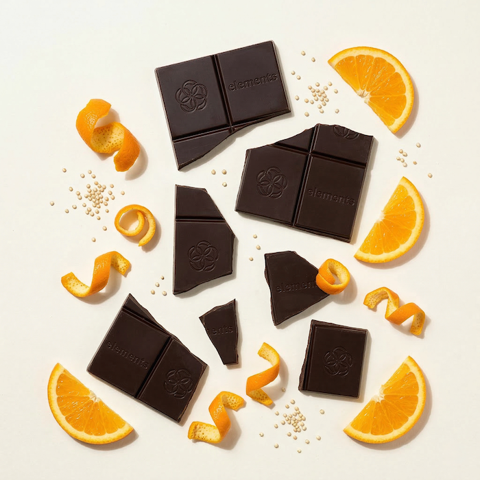 Orange Crunch dark chocolate bars with orange slices and peel by Elements Truffles